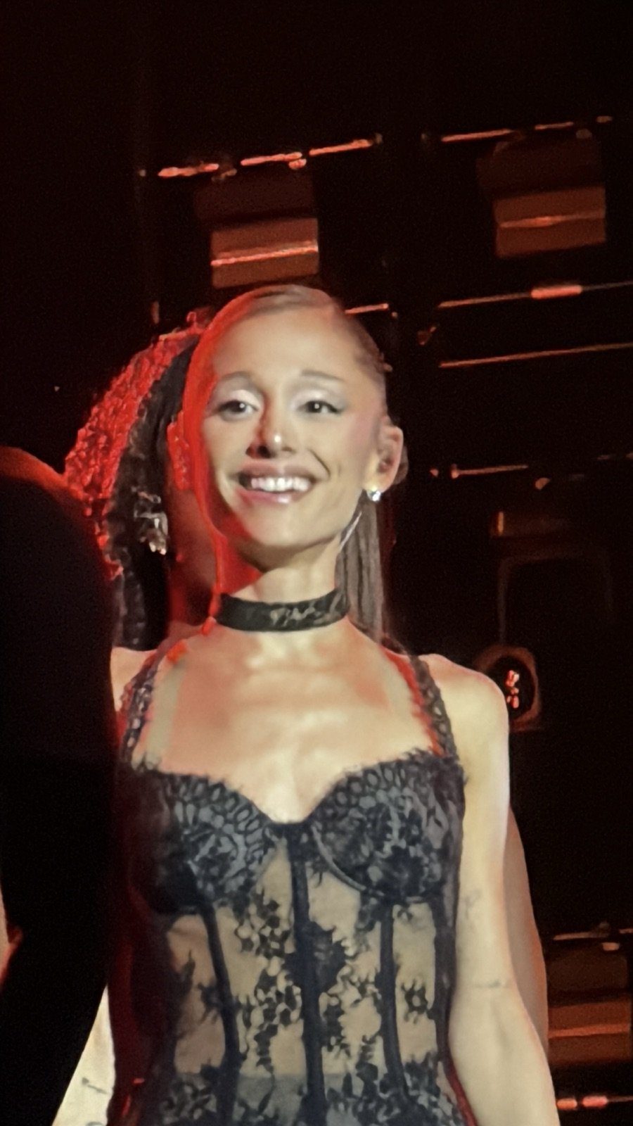 Ariana Grande smiling on stage during the Eternal Sunshine Tour in Brooklyn, July 2026